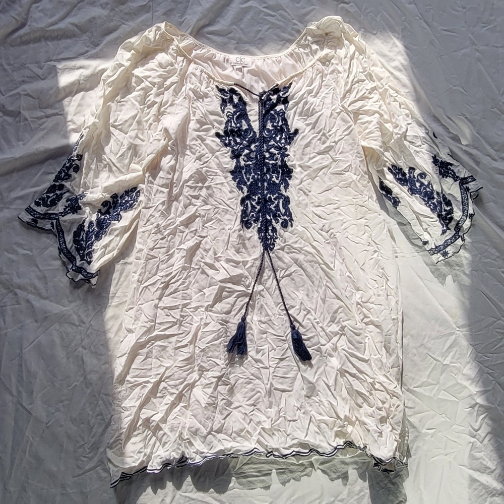 Elegant White Blouse with Navy Detailing